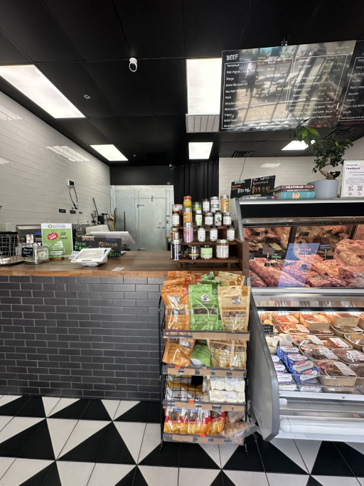 Intereor of Custom Cut Butcher with Paw Favorites products availible in a rack.